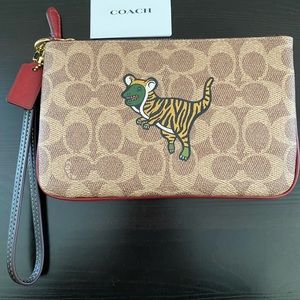 Coach Lunar New Year Small Wristlet In Signature Canvas With Tiger Rexy …